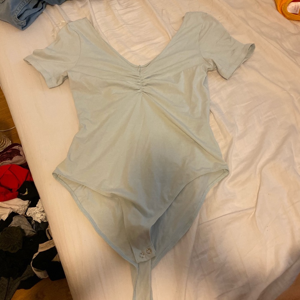 Blue off the shoulder body suit